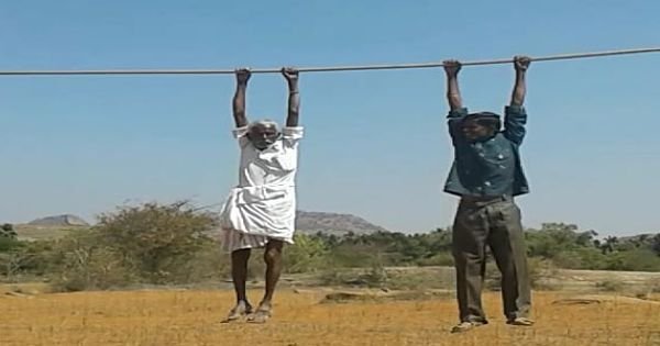 Here’s the bizarre reason why a farmer & his son landed up in air during a protest - scoopwhoop