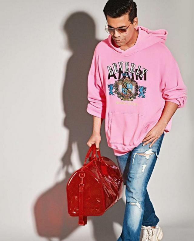 Karan Johar sports a colour changing bag that costs more than Rs 7