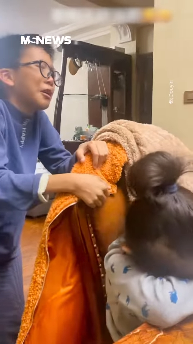 Boy Crying In Frustration As He Teaches Maths To His Sister