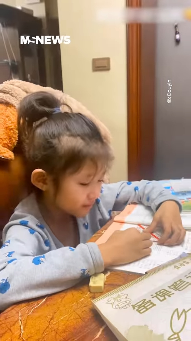 Boy Crying In Frustration As He Teaches Maths To His Sister 