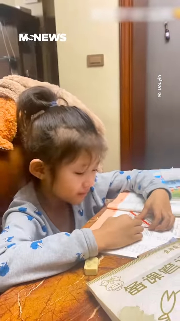 Boy Crying In Frustration As He Teaches Maths To His Sister