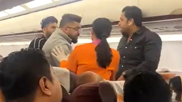 flight passengers fighting on a plane