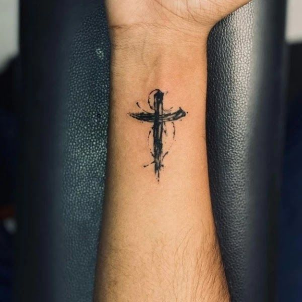 Mens small wrist tattoo