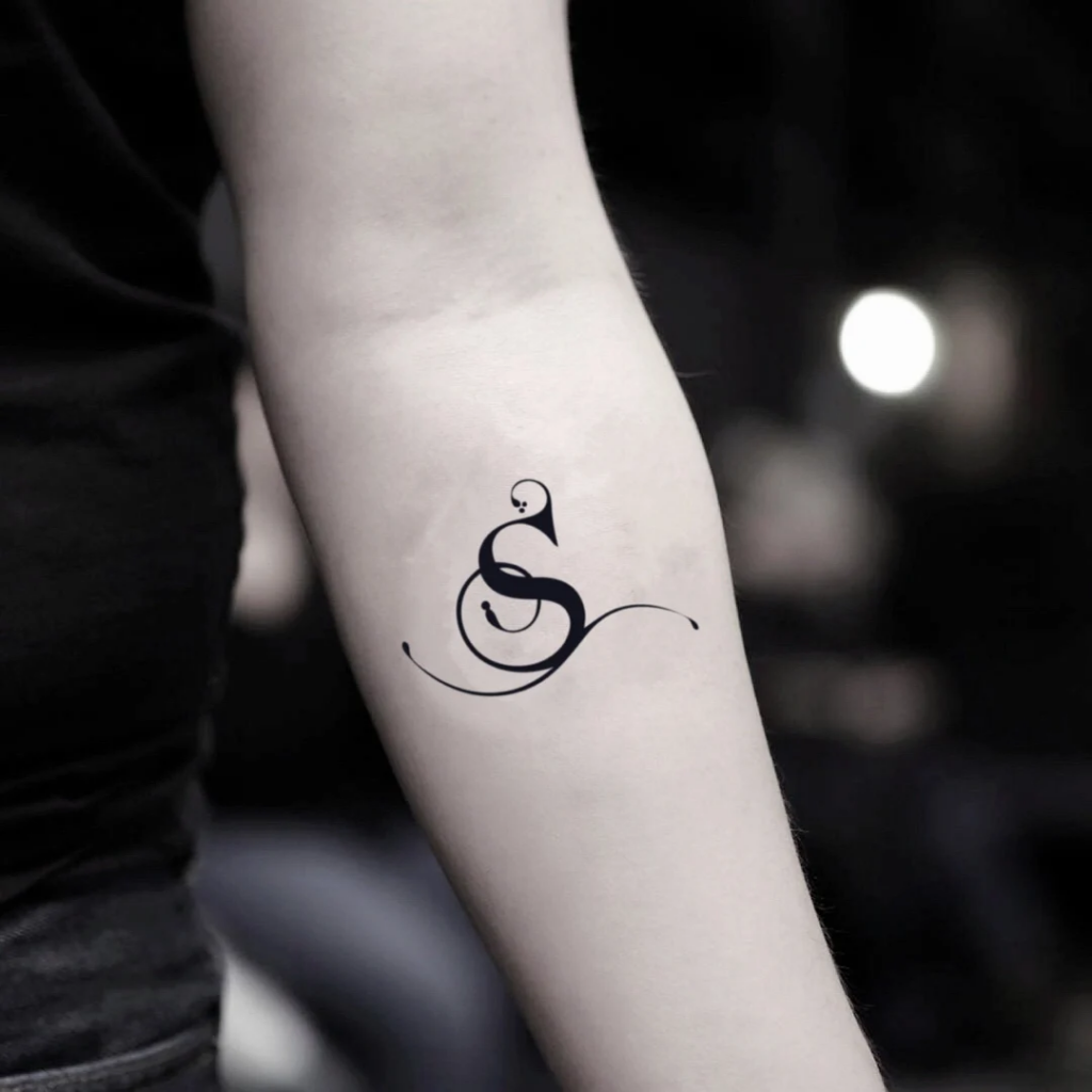 s letter tattoo on wrist