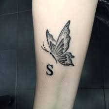 s letter tattoo on wrist