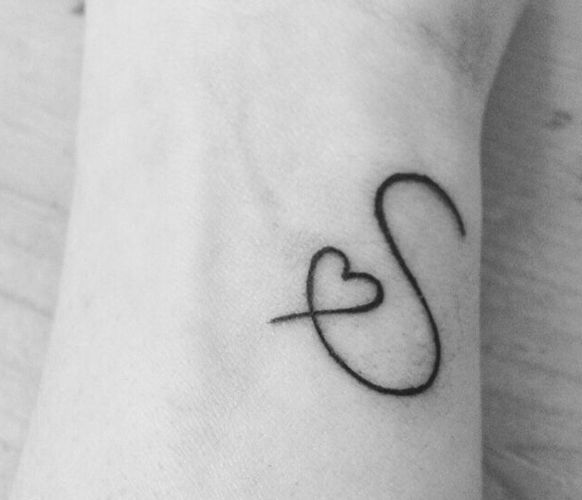 s letter tattoo on wrist