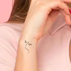 s letter tattoo on wrist