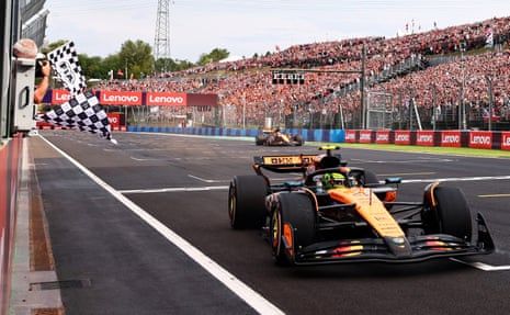 Norris wins battle with McLaren teammate Piastri to take Hungarian F1 GP