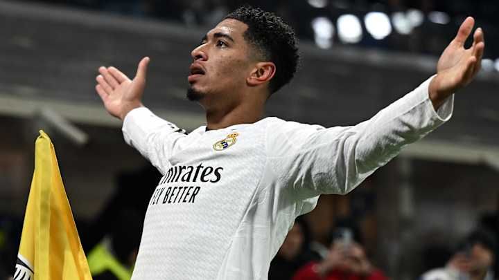 Bellingham celebrating Real Madrid goal in signature pose with crowd