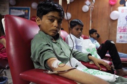 Child with thalassemia receiving blood transfusion